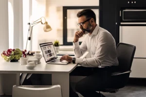 Person reviewing a web designer's portfolio, focusing on e-commerce examples.
